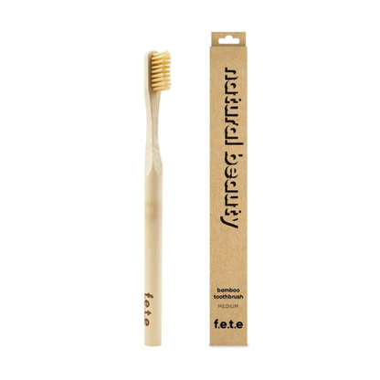 Bamboo toothbrush Natural beauty (natural bristles and brush) shown alongside cardboard box