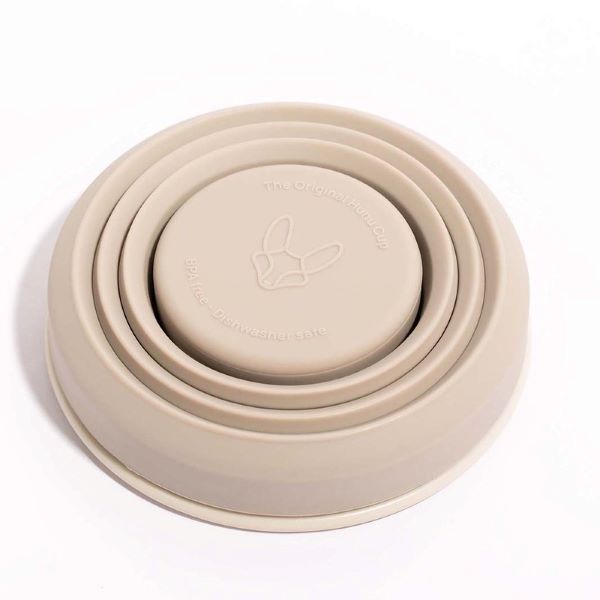 Collapsible cup shown in warm grey collapsed