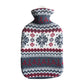 Hot water bottle in snowflake design (knitted cover with mainly blue, but also white and red nordic-style pattern with snowflakes)