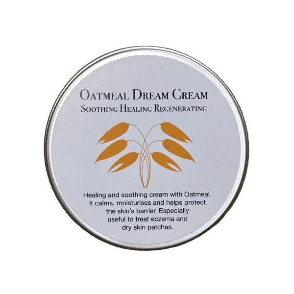 Oatmeal Dream Cream tin container with text on a white background and an image of oats