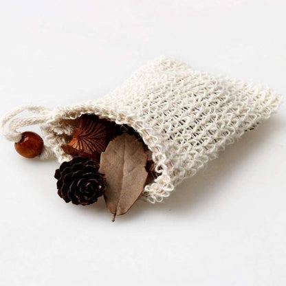 Exfoliating soap bag made of natural sisal from Jungle Culture, designed to hold soap and create a lather for cleansing.