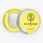 Silicone straw in yellow contained in small round tin shown with lid off and straw inside