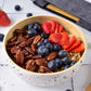 Bamboo serving bowl with fruit and nuts in white (white with coloured speckles on outside, bamboo inside)