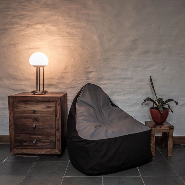 Eco-friendly bean bag Pebble and orca (light grey seat with charcoal grey base) in living room setting