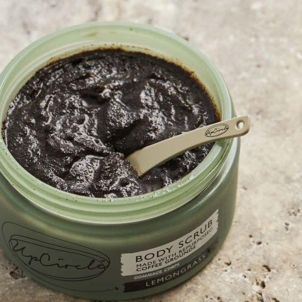 Coffee body scrub from UpCircle lemongrass Lid off with scoop