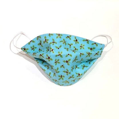 Reusable face mask Holly blue - blue background with small green holly images