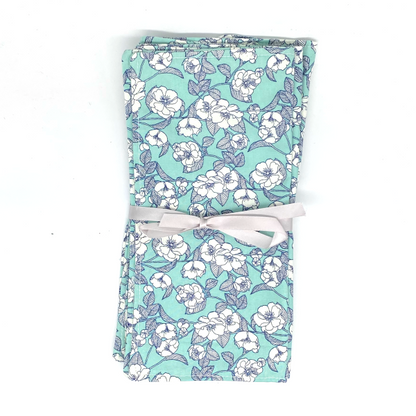 Reusable cotton napkins in Aqua flowers wrapped in ribbon