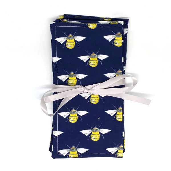 Reusable cotton napkins in Navy bee wrapped in ribbon