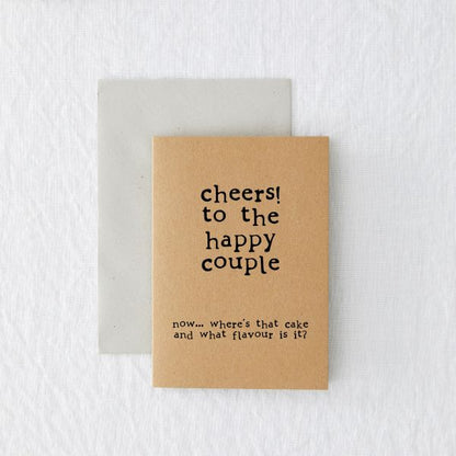 Eco card - love - wedding 'Cheers to the happy couple. Now - where's that cake and what flavour is it?'