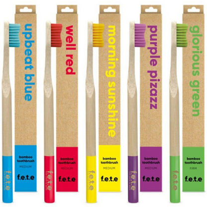 Bamboo toothbrushes mixed colours shown alongside cardboard box
