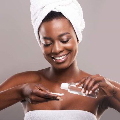 Bamboo and cotton reusable makeup remover pads in use